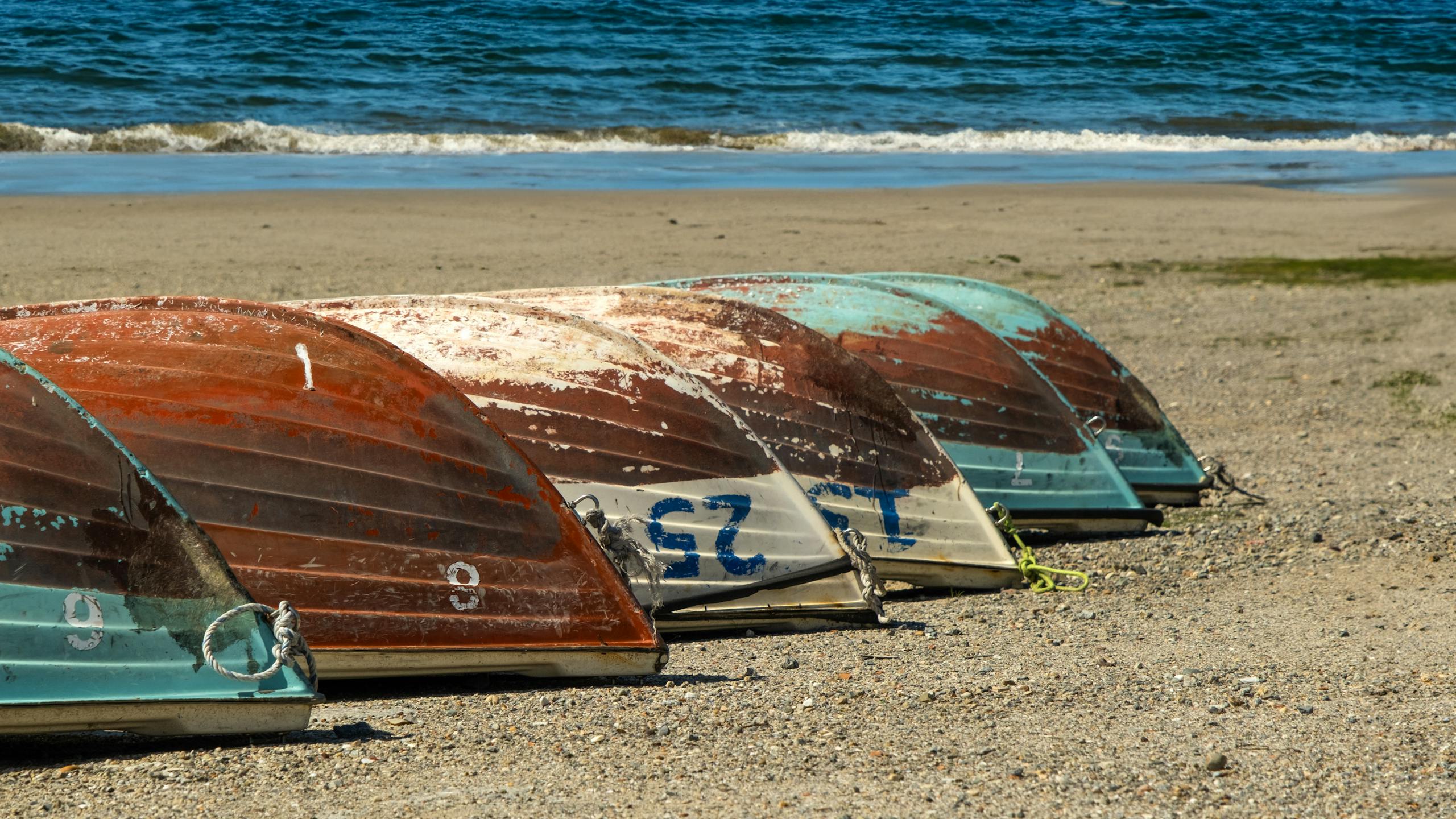 Boats Turned Upside Down on Beach